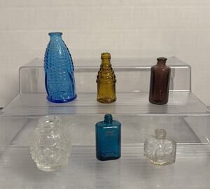 Lot of 6 Small Vintage glass bottles w/embossed Words Wheaton 1 Perfume